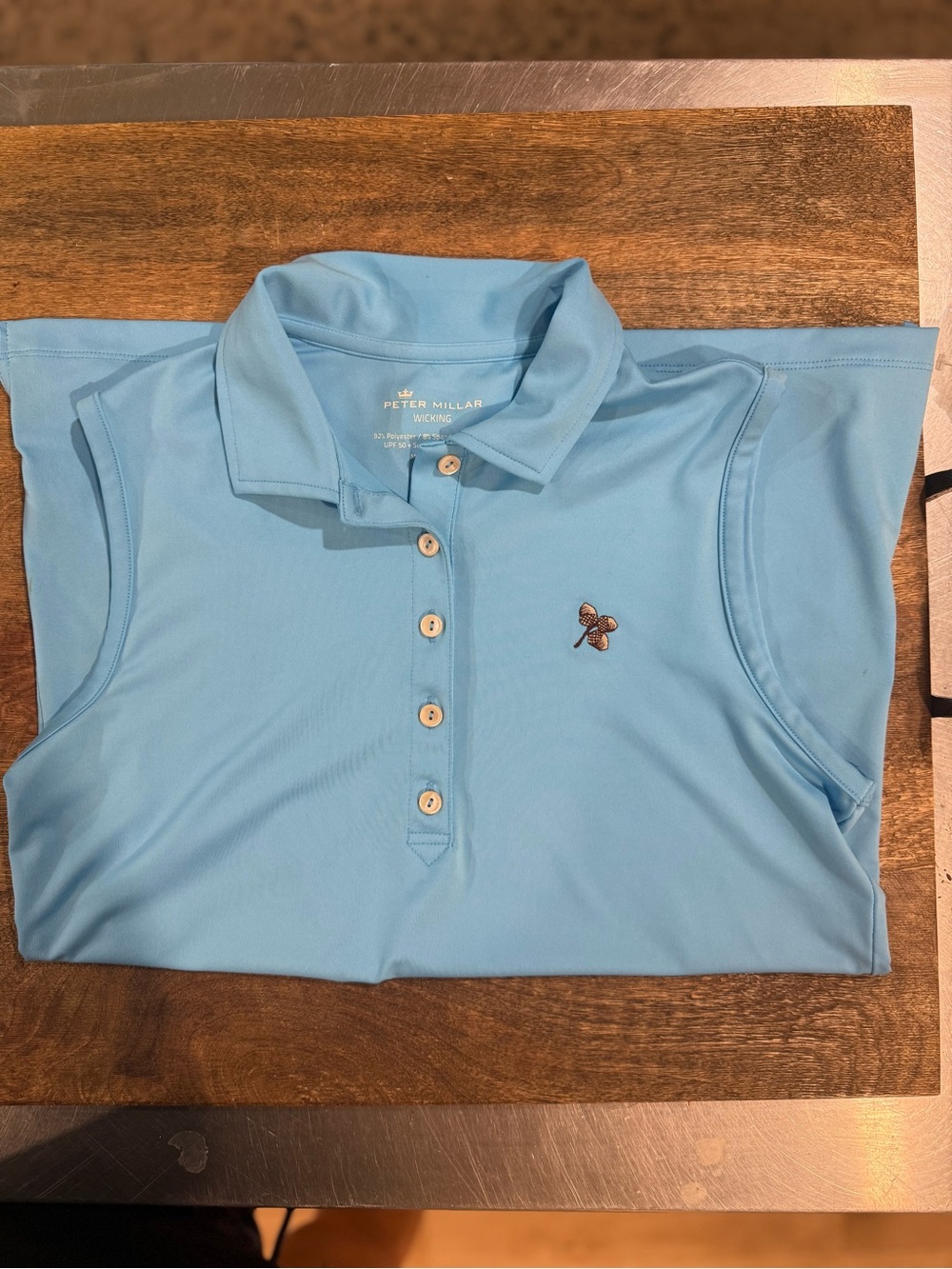 Peter Millar Woman's Sky Blue Sleeveless Polo with Acorn Emblem